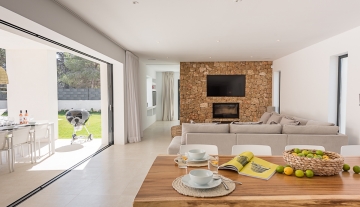 Resa estate modern villa for sale ibiza first line north living fire place.jpg